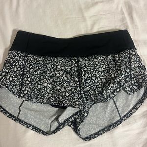 Lululemon size 4 speed up black and white shorts like new condition!